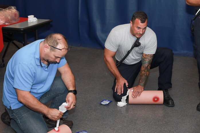 NNSY employees and emergency response personnel came together for the Stop the Bleed Training at America's Shipyard. At the training they learned how to treat bleeding victims, including applying touriquets and QuikClot.