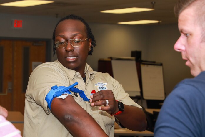 NNSY employees and emergency response personnel came together for the Stop the Bleed Training at America's Shipyard. At the training they learned how to treat bleeding victims, including applying touriquets and QuikClot.