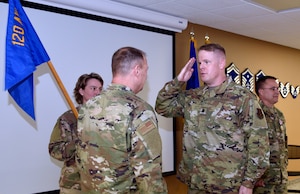 Lt. Col. Jonathan Bingham salutes Col. Buel Dickson, 120th Airlift Wing Commander, upon assuming command of the 120th Medical Group during a change of command ceremony Nov. 3, 2019 here.