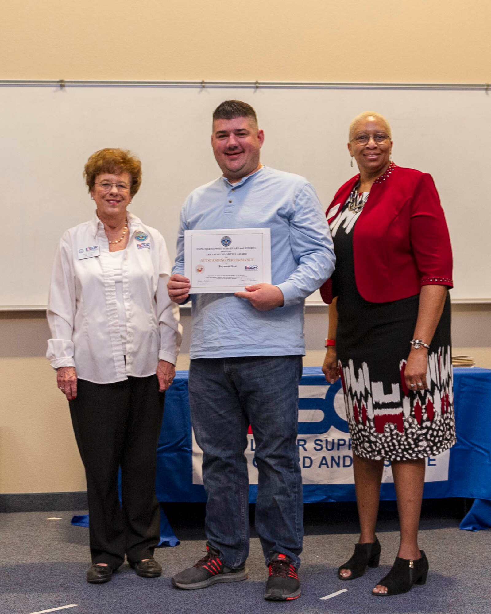 Senator Jane English presents certificates of appreciation as the ESGR state chairwoman to employers on Nov. 3, 2019, at Little Rock Air Force Base, Ark. The employers were participating in an Employer Support of the Guard and Reserve “Bosslift,” which enhances awareness and understanding between Reserve military members and the civilian employers. Activities began with a briefing by Col. Daniel Collister, 913th Airlift Group deputy commander, who expressed his gratitude to the employers. (U.S. Air Force Reserve photo by Maj. Ashley Walker)