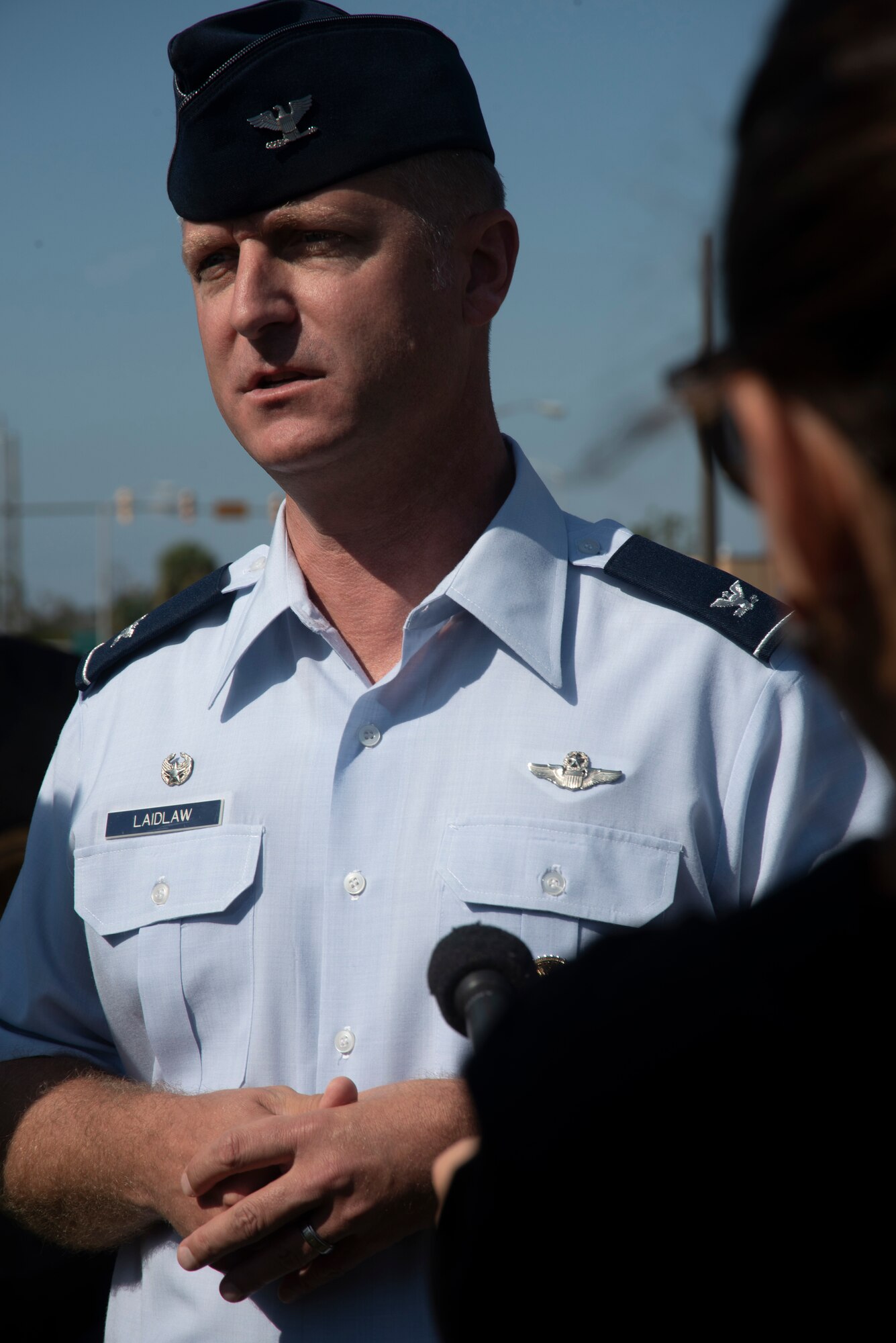 Brian Laidlaw, 325th Fighter Wing commander, is interviewed at a press pool during a groundbreaking ceremony Nov. 6, 2019, at Tyndall Air Force Base, Florida. A groundbreaking ceremony for the U.S. 98/Tyndall Air Force Base Flyover was held at Tyndall’s Flag Park. The flyover will improve mobility by separating through traffic on U.S. 98 from drivers entering and exiting Tyndall. The project represents a continued partnership with the State of Florida in supporting the rebuild process of Tyndall. This was a collaborative effort of the Florida Department of Transportation, the Federal Highway Administration, and Tyndall’s 325th Fighter Wing. (U.S. Air Force photo by Staff Sgt. Magen M. Reeves)