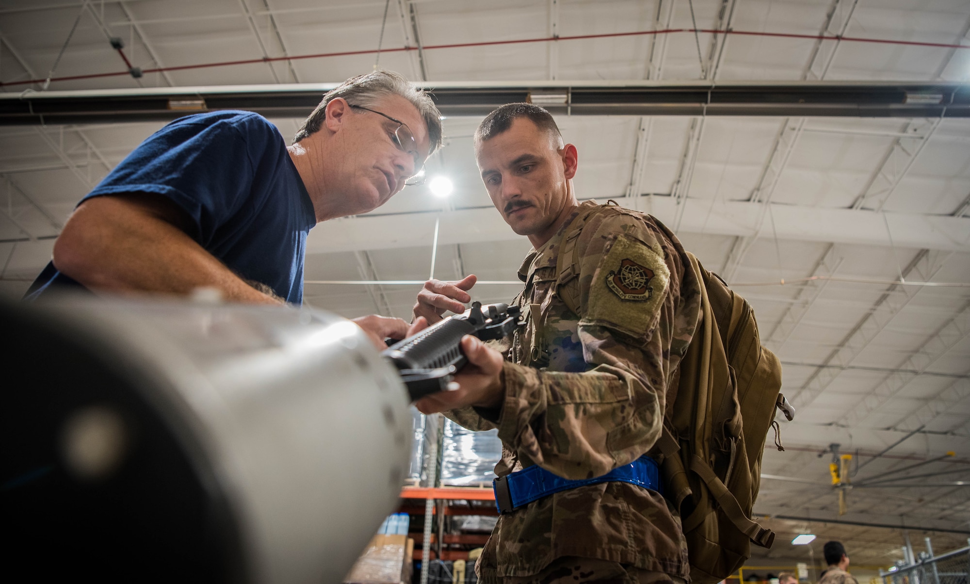 Airmen checks gun