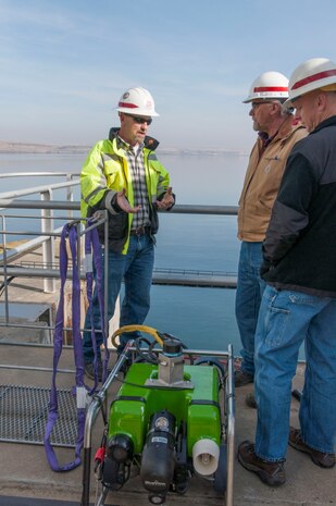 Portland District Dive Coordinator Todd Manny, Walla Walla District Dive Coordinator John Oberhelman and Alternate Portland District Dive Coordinator Jared Butler with the ROV.