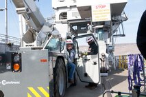 Mike Gibbs and Joel Raplee of McNary's rigging crew, pictured with their new Grove Carry Deck Crane, which was used to lift the ROV and set it in the river.