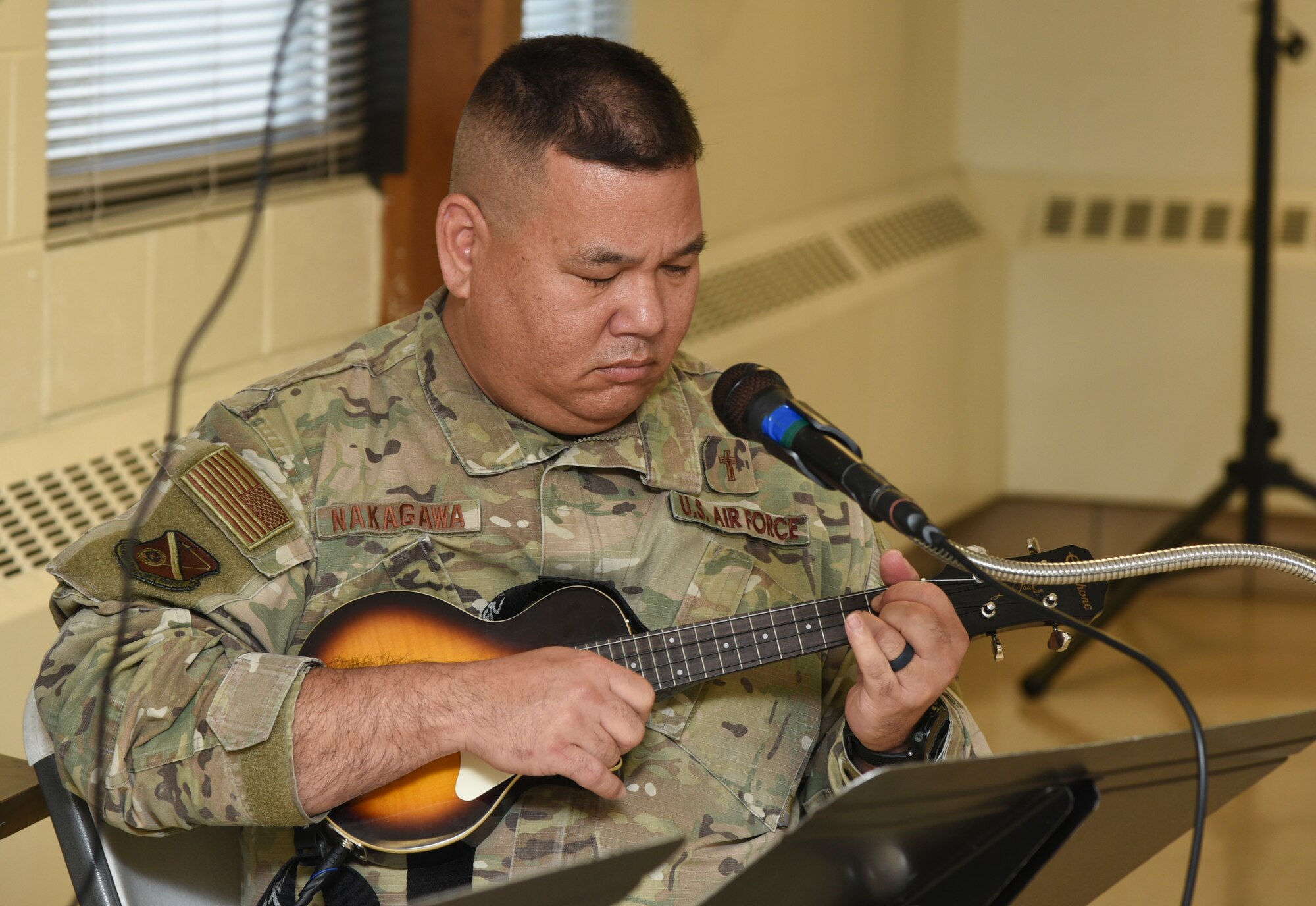 U.S. Air Force Chaplain (Maj.) Craig H. Nakagawa, 377th Deputy Wing chaplain, plays the ukulele at the Diversity Heritage Day event on Kirtland Air Force Base, N.M., Nov. 6, 2019. The event included music, food sampling, a personality workshop and panel discussion. (U.S. Air Force photo by Airman 1st Class Ireland Summers)