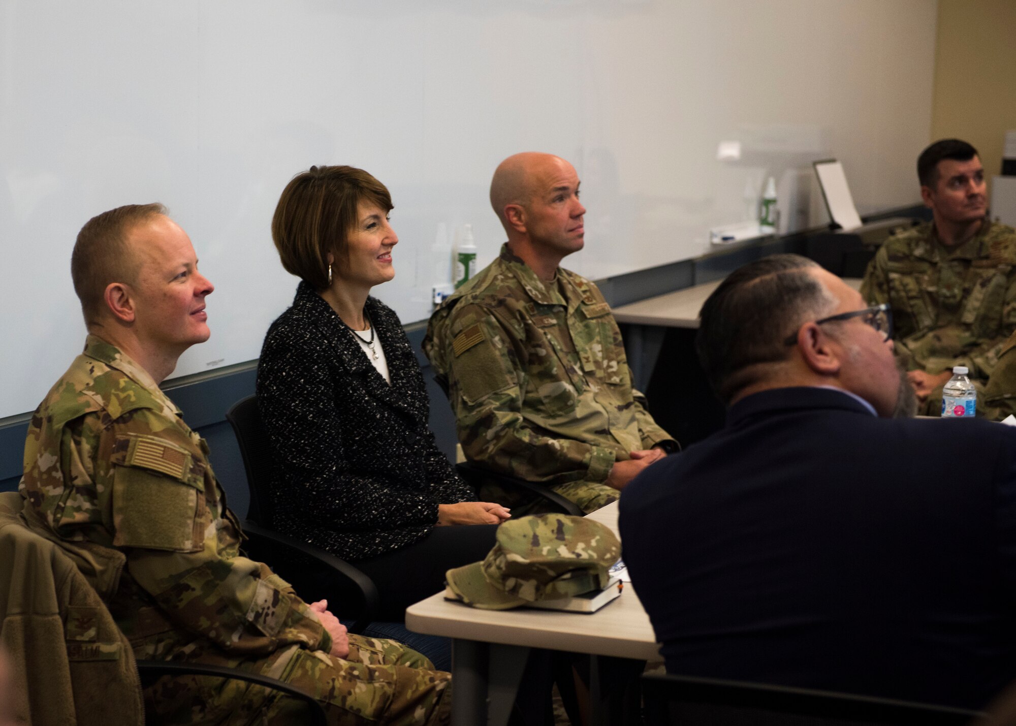 U.S. Representative Cathy McMorris Rogers listens to a brief with U.S. Air Force Col. Derek Salmi, 92nd Air Refueling Wing commander and U.S. Air National Guard Col. Larry Gardner, 141st Air Refueling commander, during her visit to Fairchild Air Force Base, Washington, Nov. 7, 2019. Wing leadership met with McMorris Rogers and her staffers to address housing availability issues as well as current civilian employment wages, in an effort to improve the quality of life and service for Airmen. (U.S. Air Force phot by Airman 1st Class Lawrence Sena)