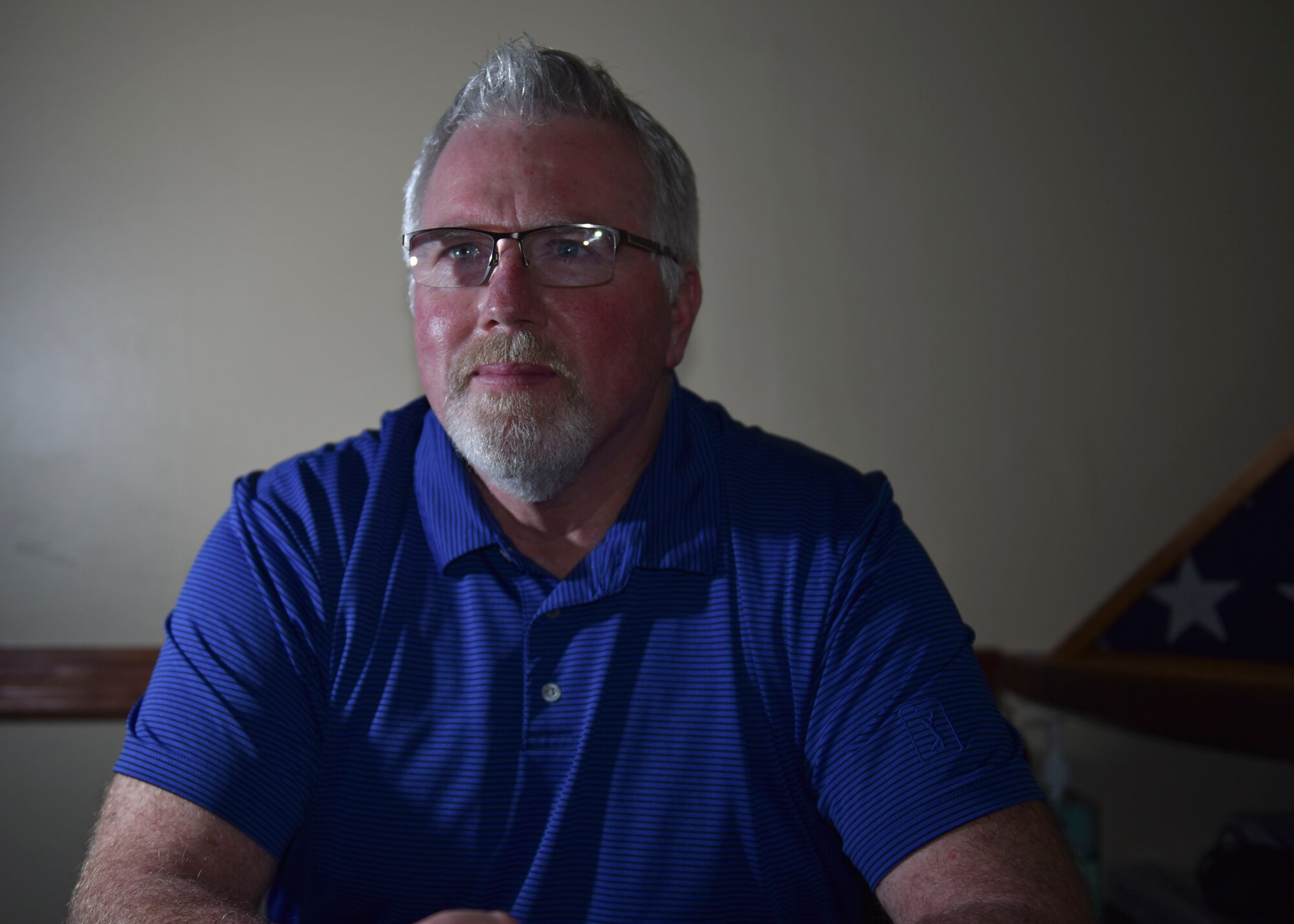 Bret Bowers, Mann-Grandstaff Veteran Affairs Medical Hospital Public Affairs officer and former U.S. Air Force buck sergeant poses for a photo at the Veteran Affairs Medical Hospital, November 7, 2019. Bowers served in the U.S. Air Force from 1986 to 1990, during which he was stationed at Incirlik Air Base, Turkey, and Wurtsmith Air Force Base, Michigan. (U.S. Air Force photo by Airman Kiaundra Miller)