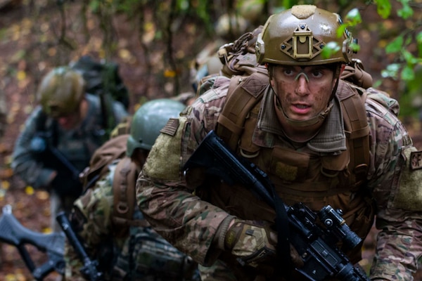 Armed airmen on patrol.
