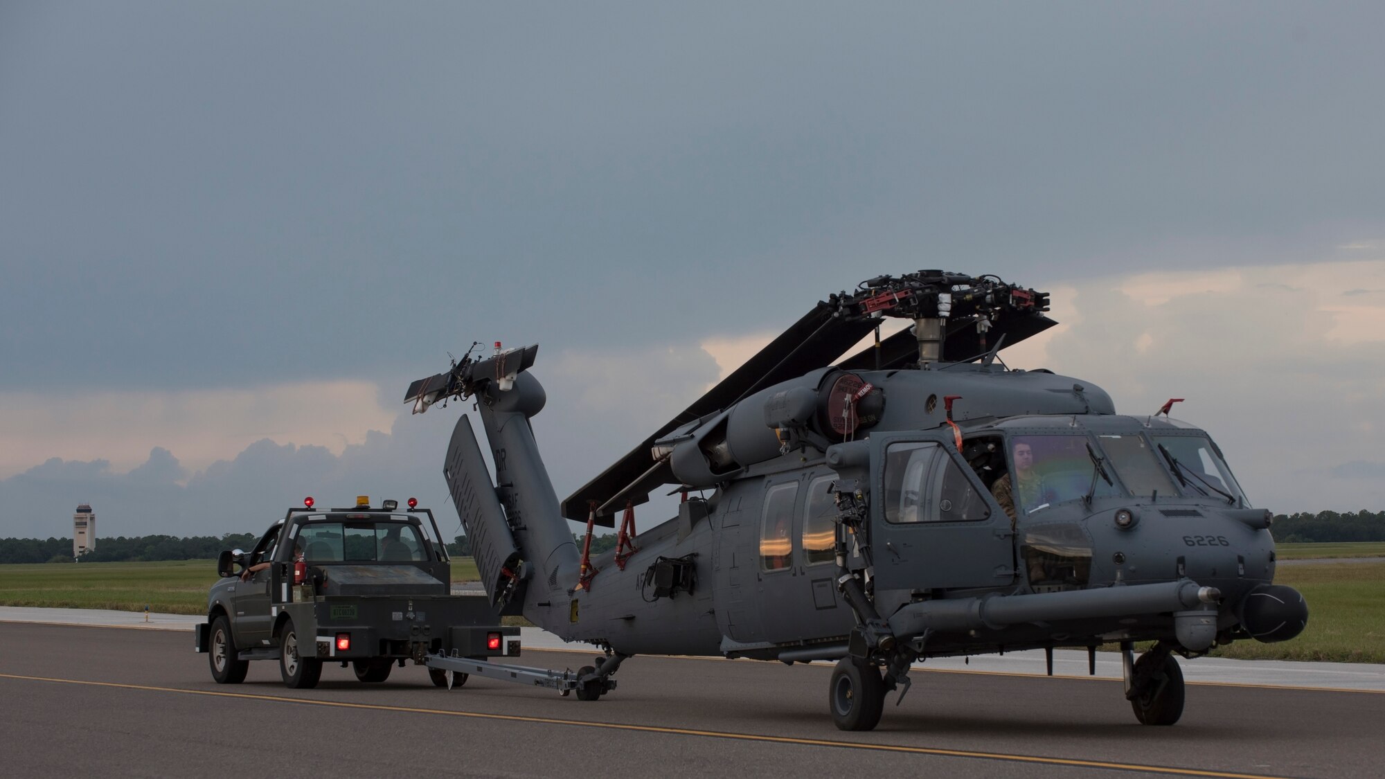 An HH-60 Pave Hawk Helicopter assigned to the 305th Rescue Squadron, Davis-Monthan Air Force Base, Ariz., is towed on the flightline at MacDill Air Force Base, Fla., Nov. 5, 2019.