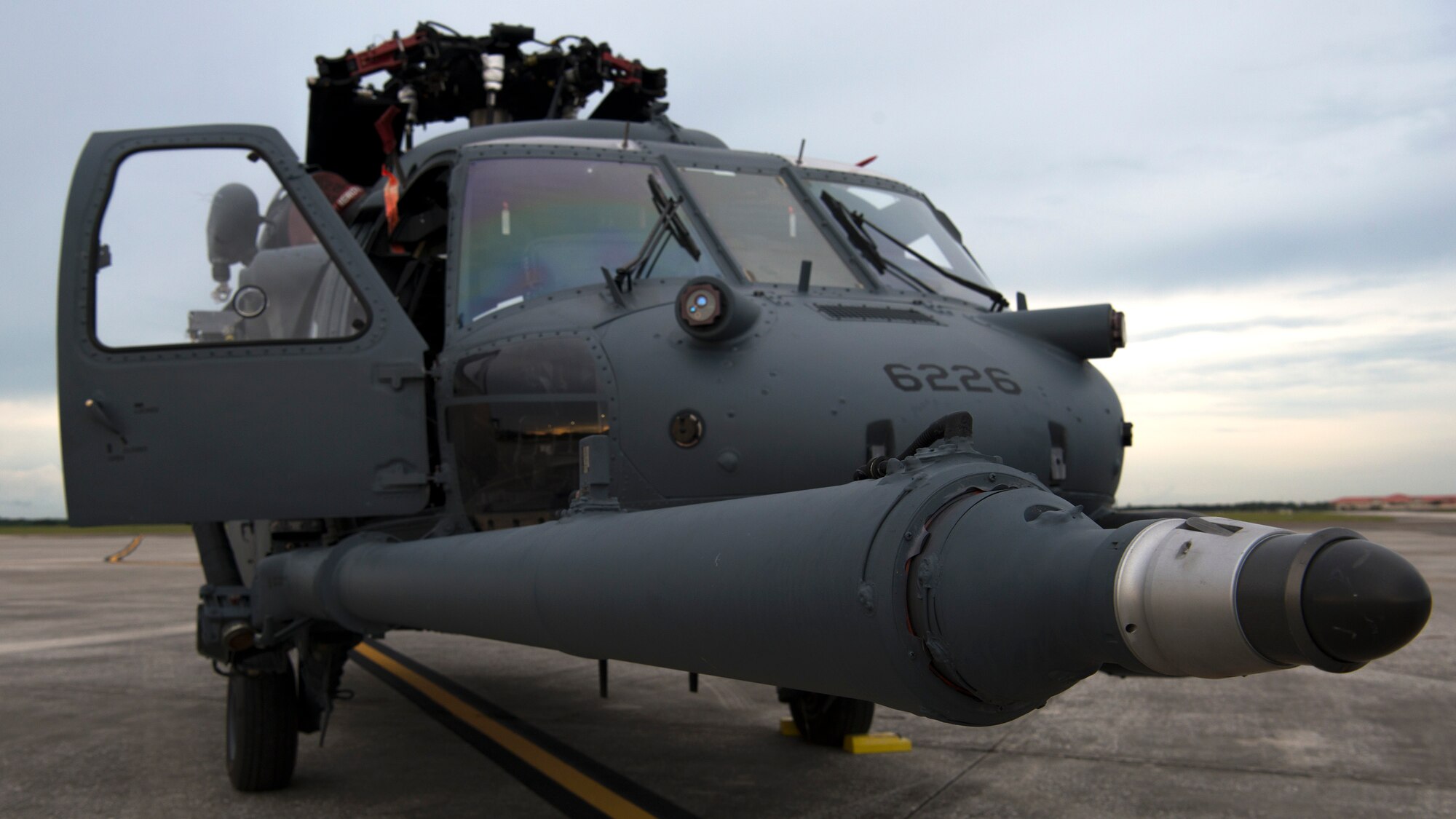 An HH-60 Pave Hawk helicopter assigned to the 305th Rescue Squadron (RQS), Davis-Monthan Air Force Base, Ariz., sits on the flightline at MacDill Air Force Base, Fla., Nov. 5, 2019.