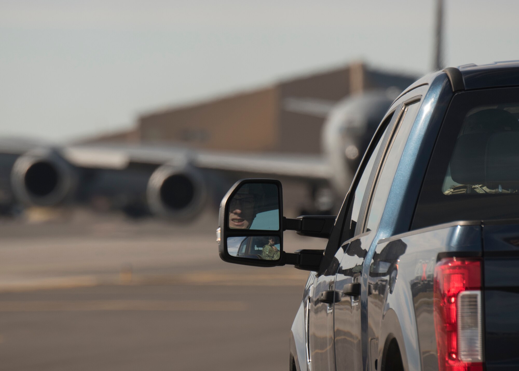 Defenders from the 92nd Security Forces Squadron secure the flightline as several KC-135 Stratotankers prepare for launch during Exercise Global Thunder at Fairchild Air Force Base, Washington, 24 Oct., 2019. Global Thunder is a U.S. Strategic Command exercise designed to ensure an efficient mission response by testing Airmen’s ability to execute command, control and operational procedures during simulated combat scenarios. (U.S. Air Force photo by Senior Airman Ryan Lackey)