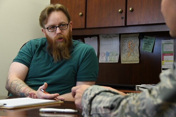 Ryan Lynn, Veterans Affairs veterans benefits advisor, discusses with an Airman about the retirement benefits that are available to him Nov. 5, 2019, at McConnell Air Force Base, Kan. Lynn provides service members, family members and veterans, assistance and a better understanding of the benefits they are entitled to once they retire. (U.S. Air Force photo by Airman 1st Class Nilsa E. Garcia)
