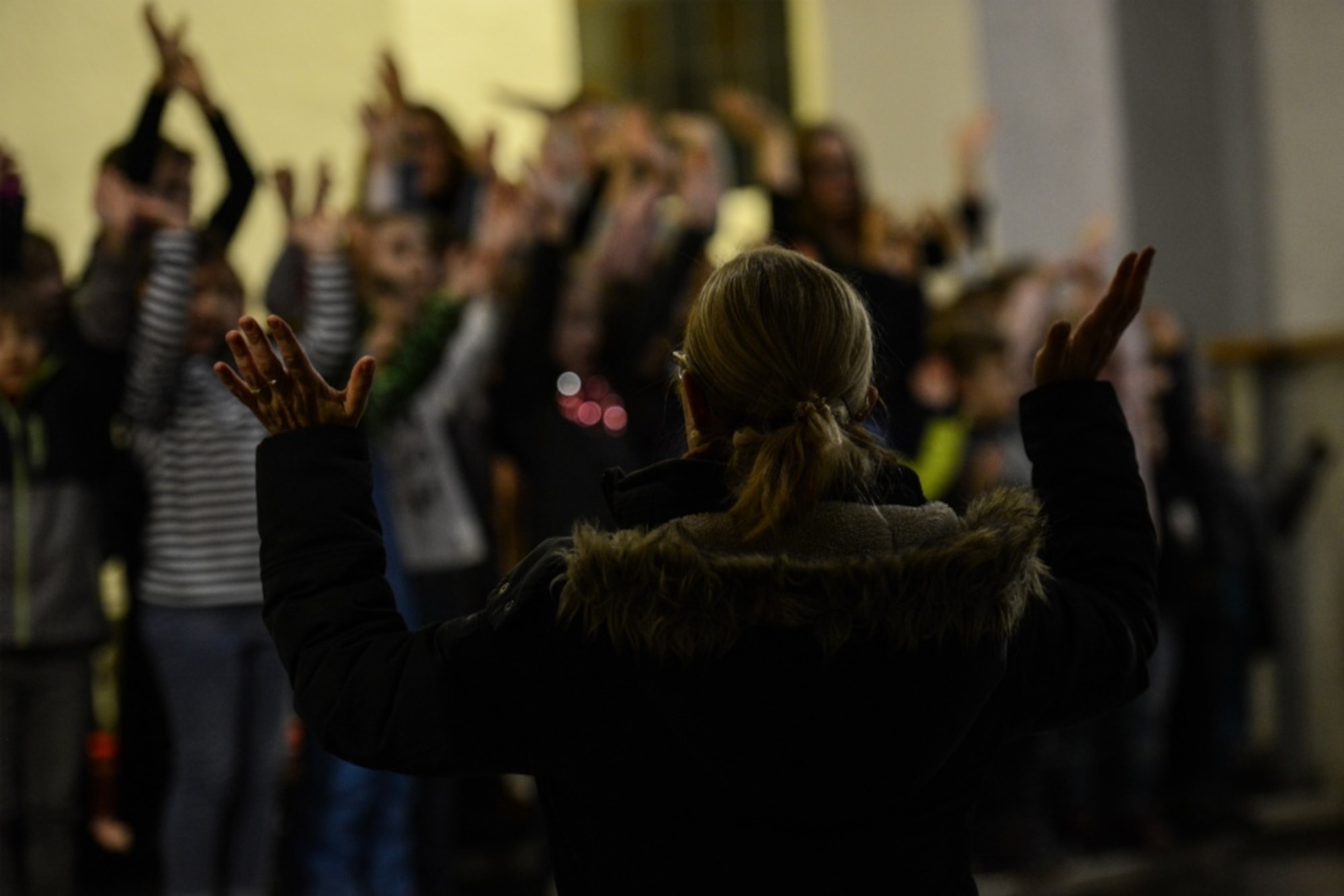 A primary school teacher sings a traditional song about Martinstag with her class.