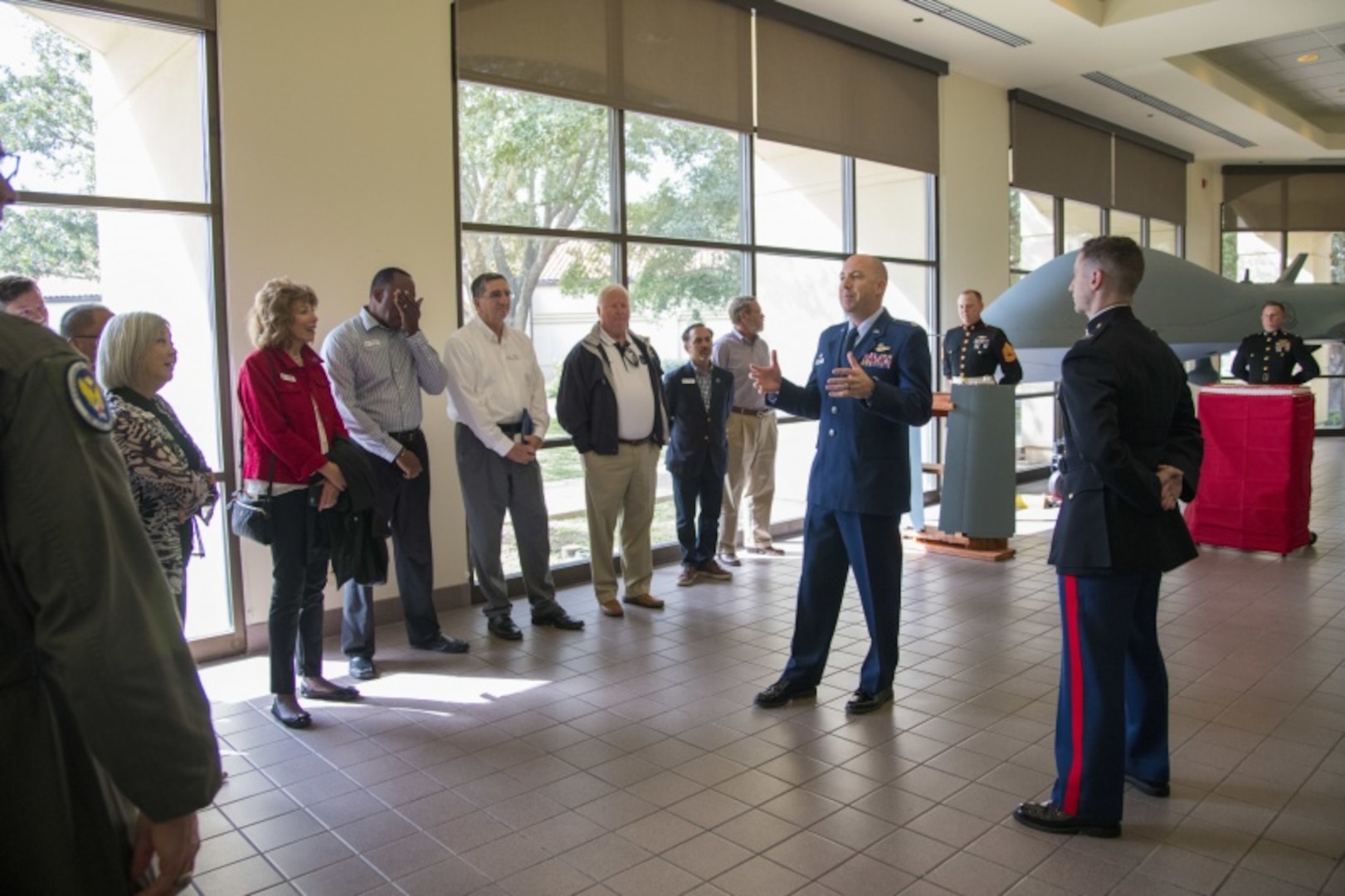 U.S. Air Force Lt. Col. Eric Bissonette welcomes civic leaders to his unit, the 558th Flying Training Squadron, during its observation of the Marine Corps birthday Nov. 6, 2019. During the visit, civic leaders toured missions of 37th Training Wing, 12th Flying Training Wing, 502nd Air Base Wing and Air Force Recruiting Service, all at JBSA locations. The Air Force Civic Leader Program is an Air Staff-level program comprising major command-selected community leaders from a wide variety of industries and sectors, including banking and economic development, construction, manufacturing, education, healthcare, science and technology.