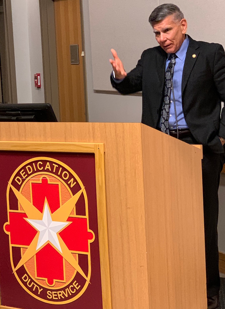 Guest speaker retired Marine Corps Maj. Gen. Juan Ayala praises veterans, past and present, for sustaining an “unbroken chain of patriotism” during the Veterans Day ceremony at Brooke Army Medical Center Nov. 1.