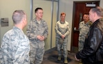 Maj. Gen. (Dr.) Josef Schmid III, mobilization assistant to the surgeon general of the Air Force, Headquarters U.S. Air Force, Washington, D.C., speaks with Col. Michael C. Brice, 433rd Medical Group commander, Chief Master Sgt. Shana C. Cullum, 433rd Airlift Wing command chief, Chief Master Sgt. Ernesto Flores Jr., 433rd MDG superintendent and Col. Terry W. McClain, 433rd AW commander, during a visit of the medical group at Joint Base San Antonio-Lackland, Texas Nov. 2, 2019.