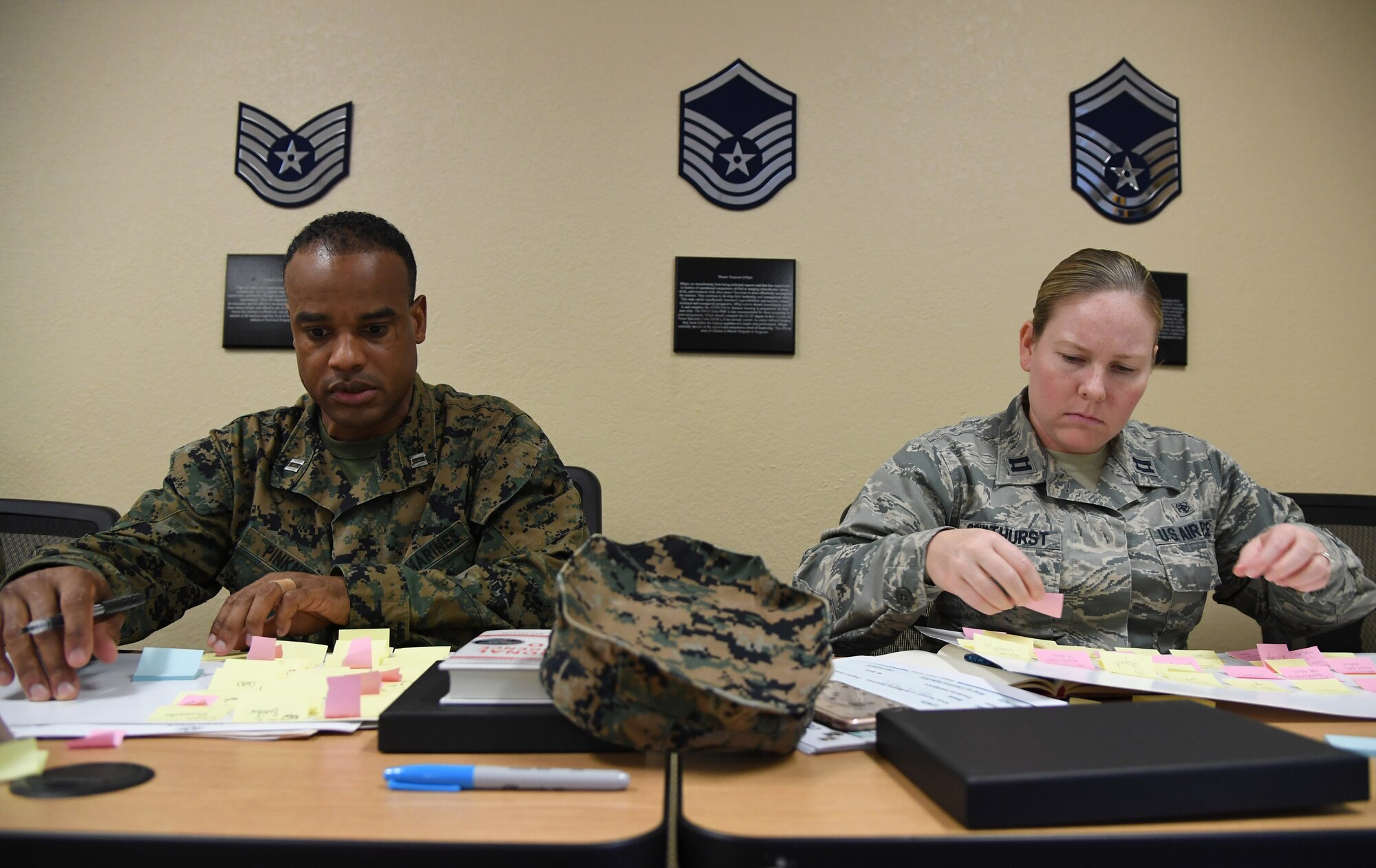 U.S. Marine Capt. Adam Pinkney, Keesler Marine Detachment commanding officer, and U.S. Air Force Capt. Daria Coulthurst, 81st Medical Support Squadron resource management NCO in charge, participate in "A Life-Mapping Experience" exercise during the Leadership Enhancement and Development Seminar inside the Airman Leadership School building at Keesler Air Force Base, Mississippi, Nov. 5, 2019. The three-day course, which is open to all supervisors, is meant to enhance effective communication, skillful interpersonal interaction and emotional intelligence in the military environment by using an active learning format that emphasizes discussion and minimizes lecture. (U.S. Air Force photo by Kemberly Groue)