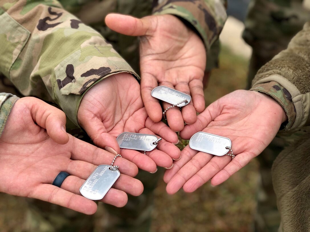 Dog tags, carried by Defender Airmen, name all Security Forces Airmen who have died performing their duties since 1950. Over 1,100 Security Forces Airmen gathered for the 12th Annual Defender Ruck, hosted by the 343rd Training Squadron, in honor of all 186 Defender Airmen who have made the ultimate sacrifice in defense of freedom, Nov. 8, here.
