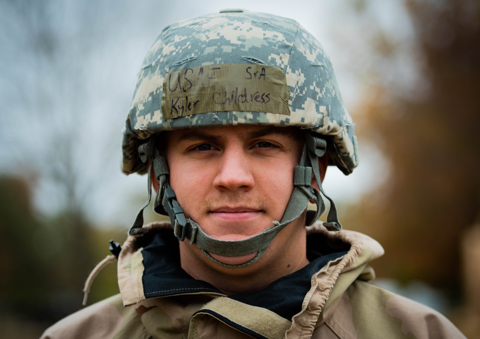 Senior Airman Kyler Childress, 375th Civil Engineer Squadron electrical systems journeyman, keeps watch of the cantonment area during a mobility exercise at Scott Air Force Base, Ill., Nov. 6, 2019. Moments later, he responded to a simulated enemy attack. (U.S. Air Force photo by Senior Airman Tara Stetler)