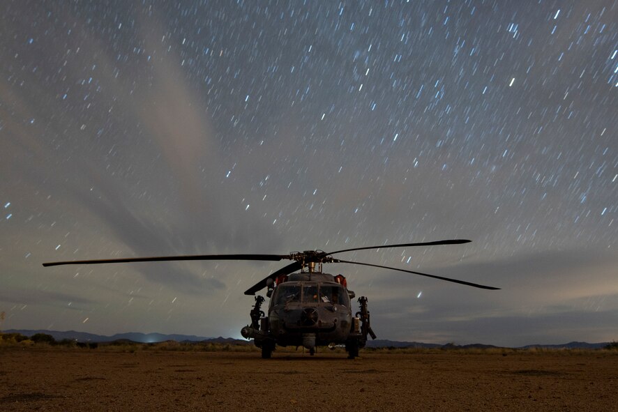 A U.S. Air Force HH-60G Pave Hawk from the 66th Rescue Squadron cloaks under the cover of darkness while exercising the Dynamic Wing concept