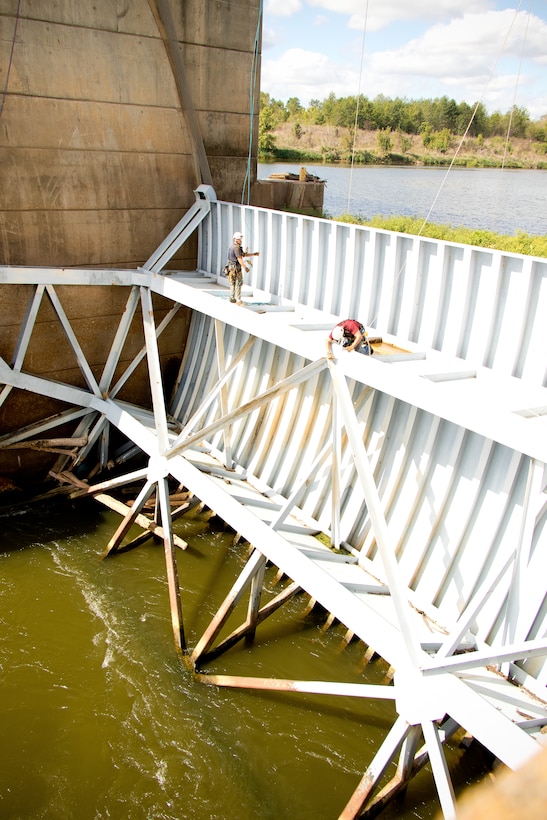 Personnel from the U.S. Army Corps of Engineers Vicksburg District inspect and perform maintenance during a complete dewatering of the John H. Overton Lock and Dam, located on the Red River near Alexandria, Louisiana, Sept. 26.