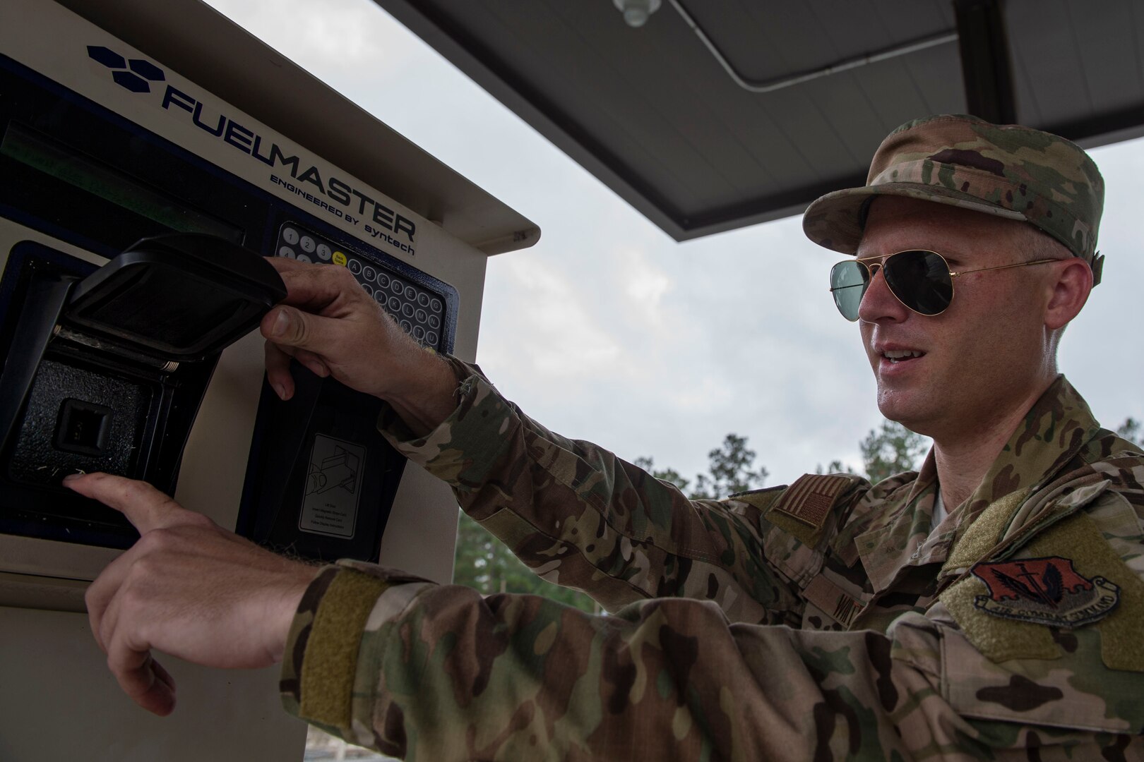 Staff Sgt. Bryan White, 23d Logistics Readiness Squadron (LRS) fuels facilities NCO in charge, checks a vehicle interface link socket for damage Oct. 30, 2019, at Moody Air Force Base, Ga. The 23d LRS fuels facilities is responsible for maintaining facilities, product purity, storage and accountability. Fuels facilities Airmen maintain the base service station by performing routine checks on the operating valves, fuel tanks and service station parts. (U.S. Air Force photo by Airman Azaria E. Foster)