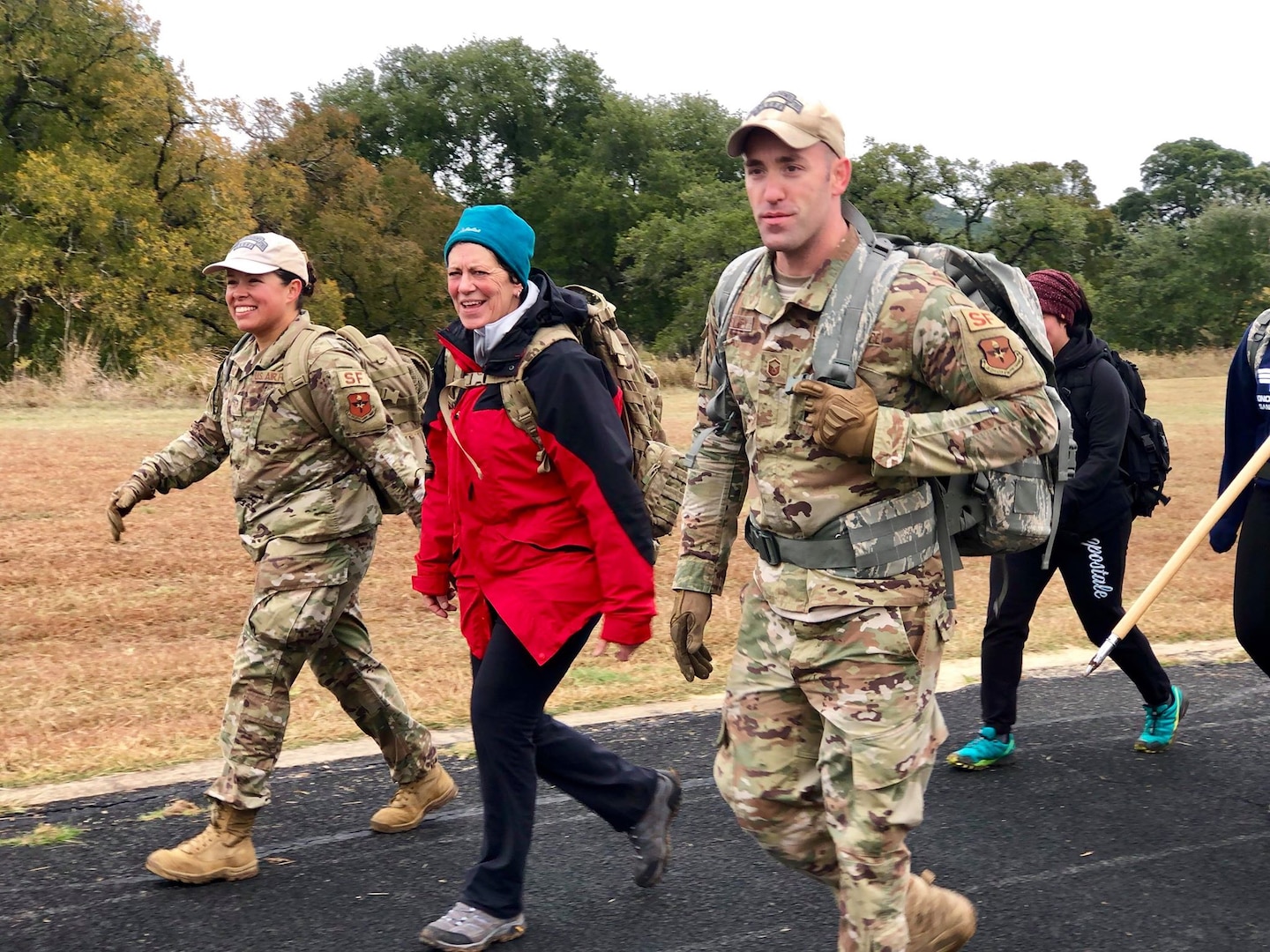 Gold Star Mother, Christine Herwick, and teammates cross the Defender Ruck 2019 finish line. Over 1,100 Security Forces Airmen gathered for the 12th Annual Defender Ruck, hosted by the 343rd Training Squadron, in honor of all 186 Defender Airmen who have made the ultimate sacrifice in defense of freedom, Nov. 8, here.