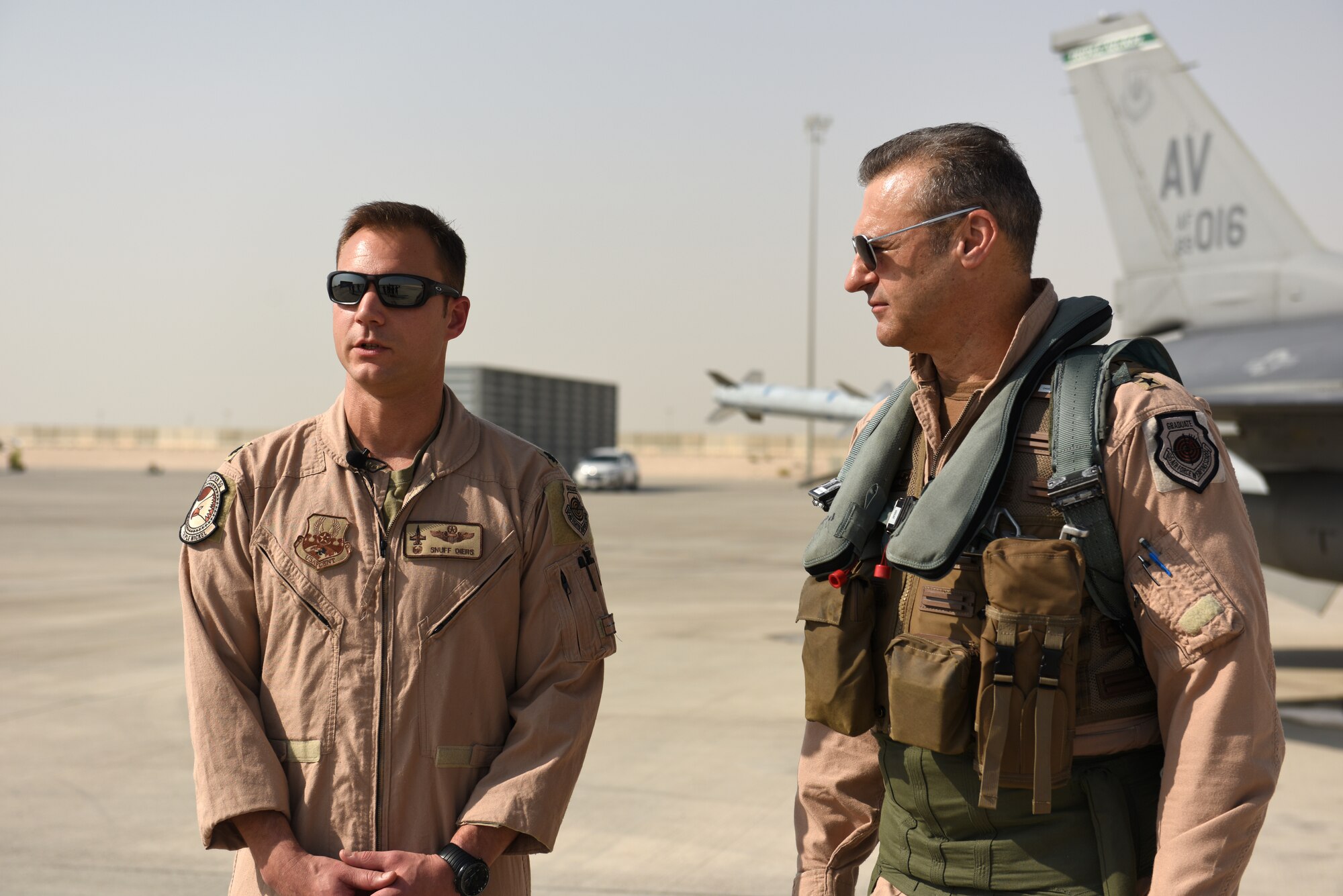 U.S. Air Force Lt. Gen. Joseph Guastella, commander of U.S. Air Forces Central Command, and USAF Lt. Col. Beau Diers, commander of the 555th Fighter Squadron, talk about the squadron’s role and history in AFCENT, Nov. 4, 2019.