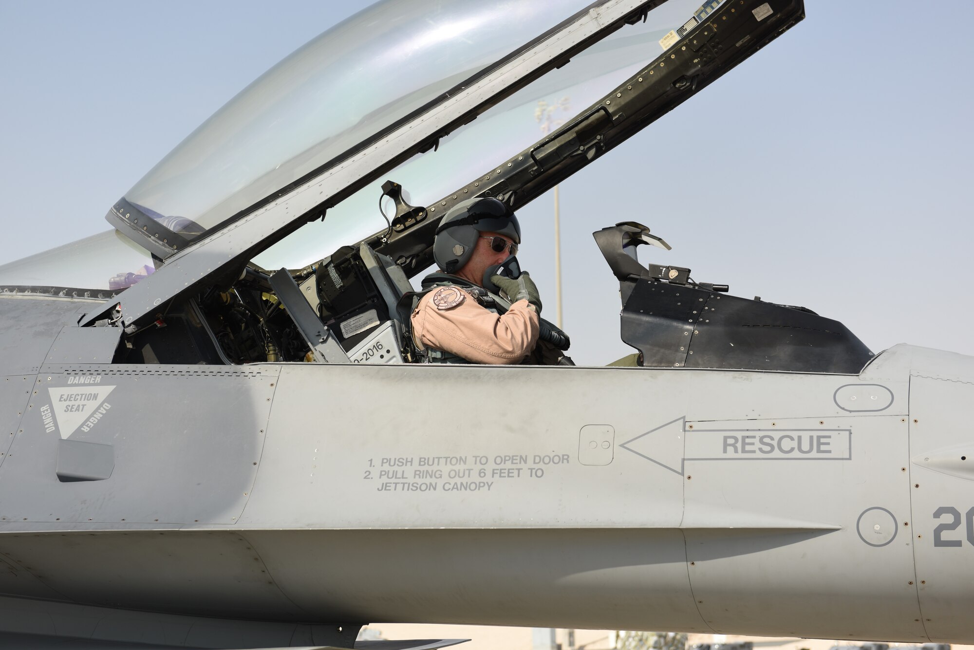 U.S. Air Force Lt. Gen. Joseph Guastella, commander of U.S. Air Forces Central Command and former commander of the 555th Fighter Squadron from October 2003 to July 2005, prepares for his flight in an F-16 Fighting Falcon at Al Udeid Air Base, Qatar Nov. 4, 2019.