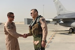 U.S. Air Force Lt. Gen. Joseph Guastella, commander of U.S. Air Forces Central Command and former commander of the 555th Fighter Squadron from October 2003 to July 2005, prepares for his flight in an F-16 Fighting Falcon at Al Udeid Air Base, Qatar Nov. 4, 2019.