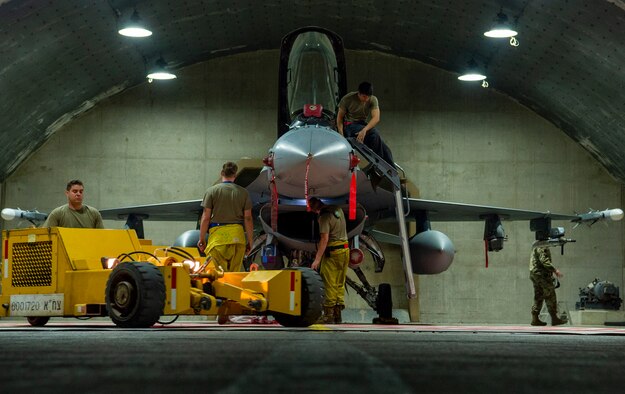 U.S. Air Force Airmen from the 52nd Aircraft Maintenance Squadron, perform postflight maintenance on an F-16 Fighting Falcon during Blue Flag 2019 at Uvda Air Base, Israel, November 6, 2019. Twelve F-16s along with approximately 250 personnel from the 52nd Fighter Wing deployed to Israel to support the exercise. (U.S. Air Force photo by Airman 1st Class Kyle Cope)
