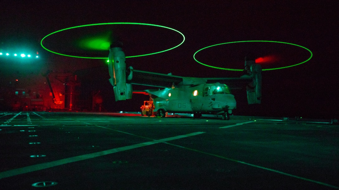 U.S. Marines assigned to Medium Tiltrotor Squadron 161, attached to Special Purpose Marine Air-Ground Task Force-Crisis Response-Central Command 19.2, conduct MV-22 Osprey night landing qualifications, logistics support, and refueling operations with expeditionary staging base USS Lewis B. Puller in an undisclosed location, Nov. 2, 2019. The SPMAGTF-CR-CC is a quick reaction force, prepared to deploy a variety of capabilities across the region.