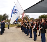 Members of the Douglas MacArthur High School Army Junior ROTC present the colors at the start of the Fort Sam Houston National Cemetery Veterans Day Ceremony Nov. 11.