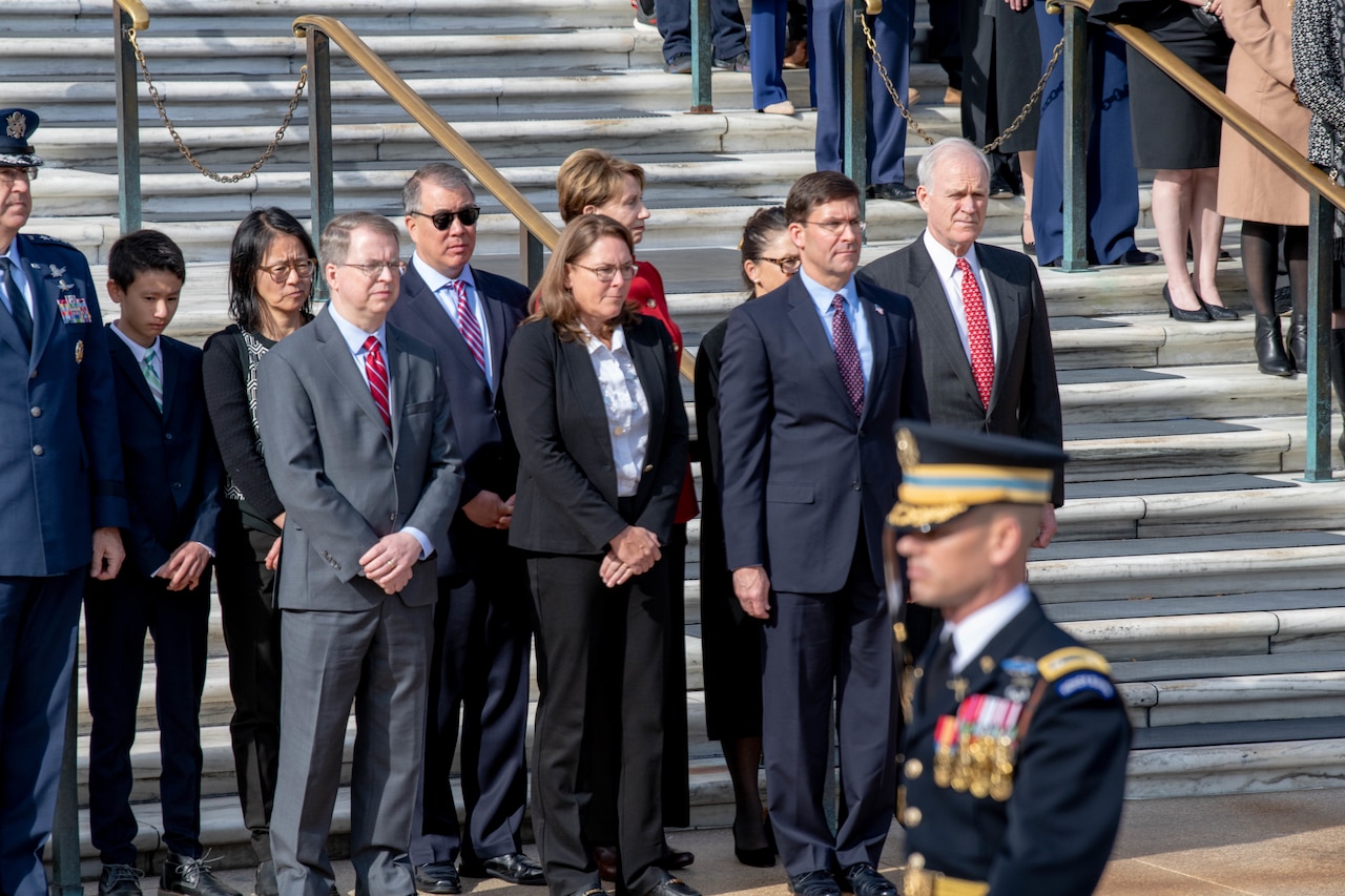 Defense Secretary Dr. Mark T. Esper and Deputy Defense Secretary David L. Norquist stand in a crowd.