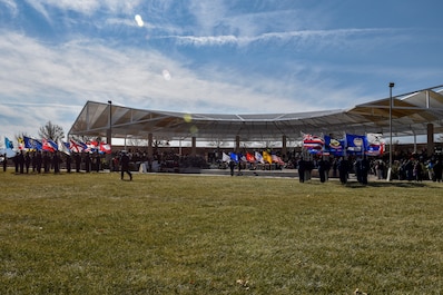 Participants and attendees of the Albuquerque Veterans Day ceremony wait for the ceremony to start at the New Mexico Veterans Memorial Nov. 11, 2019. The ceremony started off with a bell ringing 11 times on the 11th hour, a tradition celebrating the end of WWI, which ended on the eleventh day of the eleventh month in the year 1918. (U.S. Air Force photo by Airman 1st Class Austin J. Prisbrey)