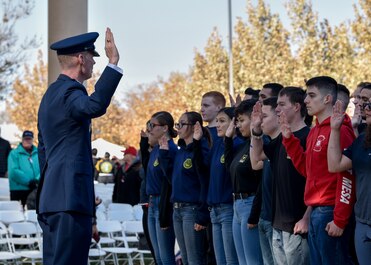 U.S. Air Force Col. David S. Miller (left), administers the Oath of Enlistment in Albuquerque at the New Mexico Veterans Memorial Nov. 11, 2019. Approximately 40 recruits participated and are ready to ship to basic military training. (U.S. Air Force photo by Airman 1st Class Austin J. Prisbrey)