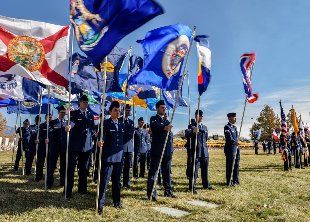 Airmen from Kirtland Air Force Base perform flag detail duties during the Albuquerque Veterans Day ceremony at the New Mexico Veterans Memorial Nov. 11, 2019. Veterans Day, was originally called Armistice Day, celebrating the end of WWI. (U.S. Air Force photo by Airman 1st Class Austin J. Prisbrey)