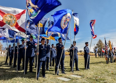 Airmen from Kirtland Air Force Base perform flag detail duties during the Albuquerque Veterans Day ceremony at the New Mexico Veterans Memorial Nov. 11, 2019. Veterans Day, was originally called Armistice Day, celebrating the end of WWI. (U.S. Air Force photo by Airman 1st Class Austin J. Prisbrey)