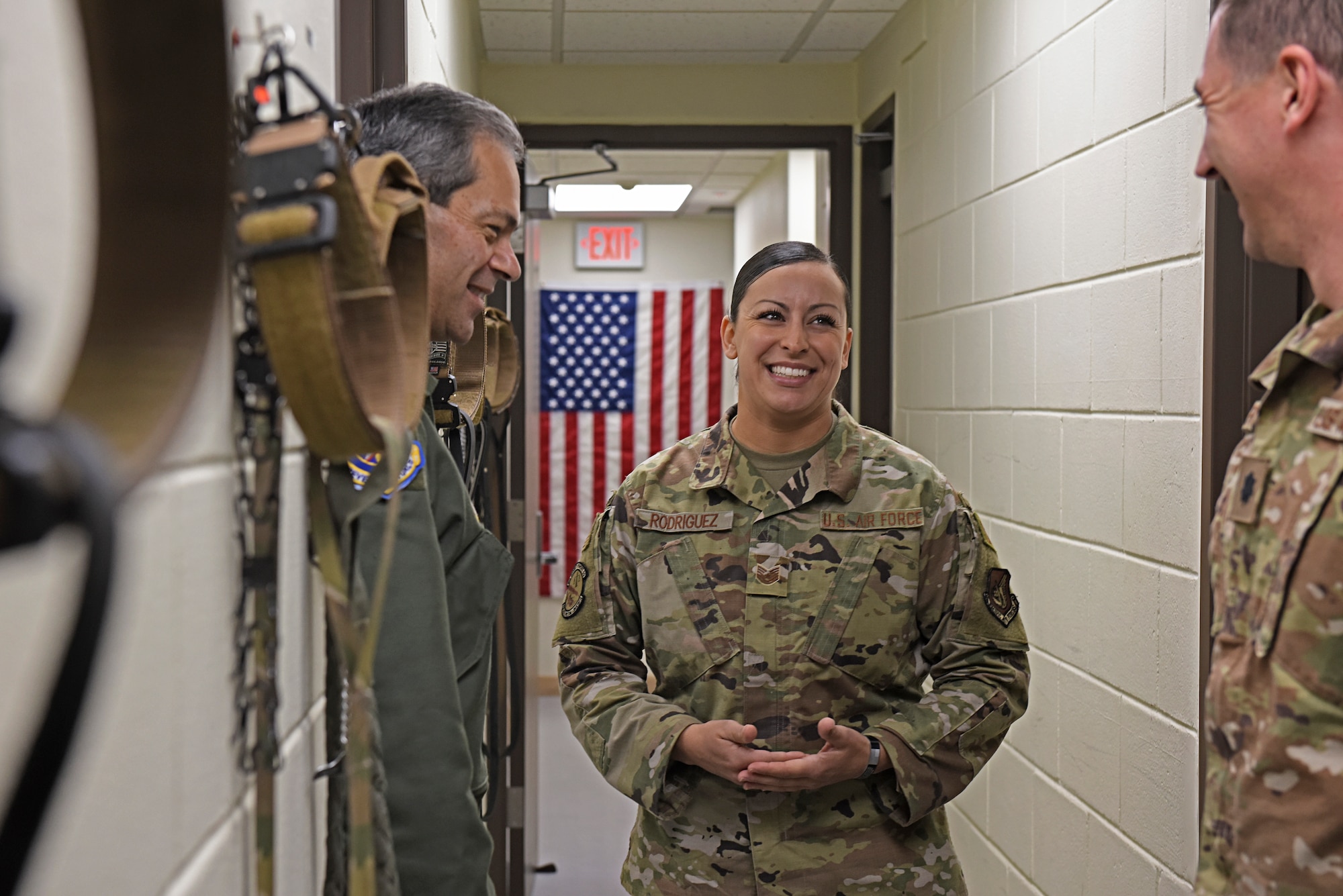 U.S. Air Force Tech. Sgt. Monica Rodriguez, 8th Security Forces Squadron Military Working Dog kennel master, provides Lt. Gen. Ken Wilsbach, 7th Air Force commander, a tour of the kennels during a base visit, Nov. 8, 2019. Rodriguez spoke about the innovative ways handlers are conducting preventative health care for their MWDs. (U.S. Air Force photo by Staff Sgt. Mackenzie Mendez)