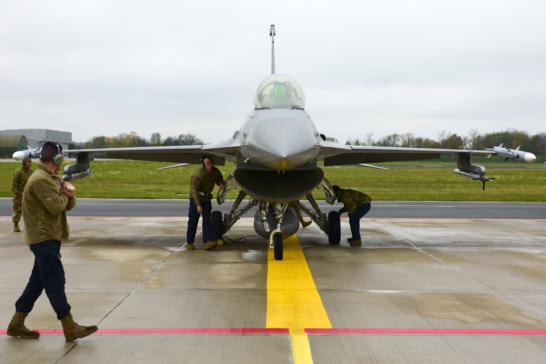 U.S. Airmen assigned to the 31st Aircraft Maintenance Squadron, 510th Aircraft Maintenance Unit, run through post-flight checks on an F-16 Fighting Falcon from the 510th Fighter Squadron in Brezice, Slovenia, Nov. 6, 2019. The exercise was intended to test the ability of the 31st Fighter Wing to rapidly deploy crews and equipment to a remote location and keep the mission going, which is a tenet of U.S. Air Forces in Europe’s Agile Combat Employment concept. (U.S. Air Force photo by Staff Sgt. Kelsey Tucker)