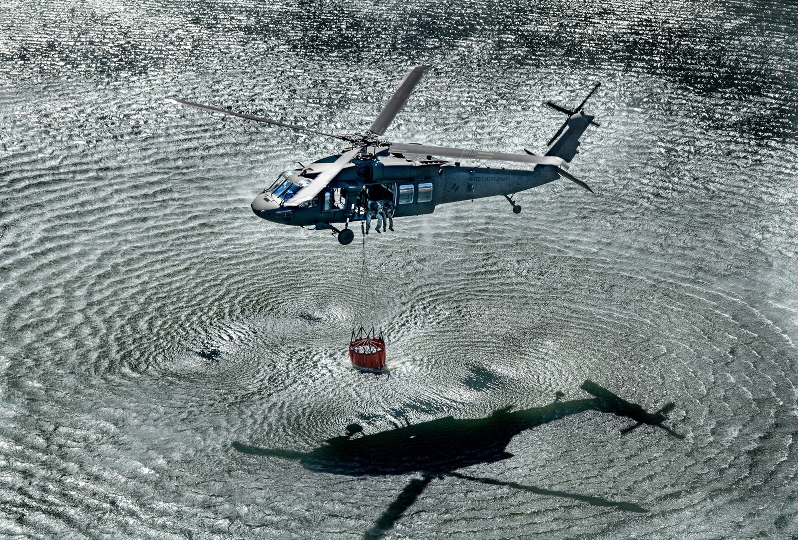 Members of the West Virginia Army National Guard's (WVARNG) Company C, 1st Battalion, 150th Aviation Regiment completed helicopter bucket training for three aircrews consisting of 12 Soldiers at Camp Dawson, West Virginia, Oct. 10, 2019. This type of familiarization training ensures that aircrew members can successfully link with civilian firefighting agencies to respond to wildfires.