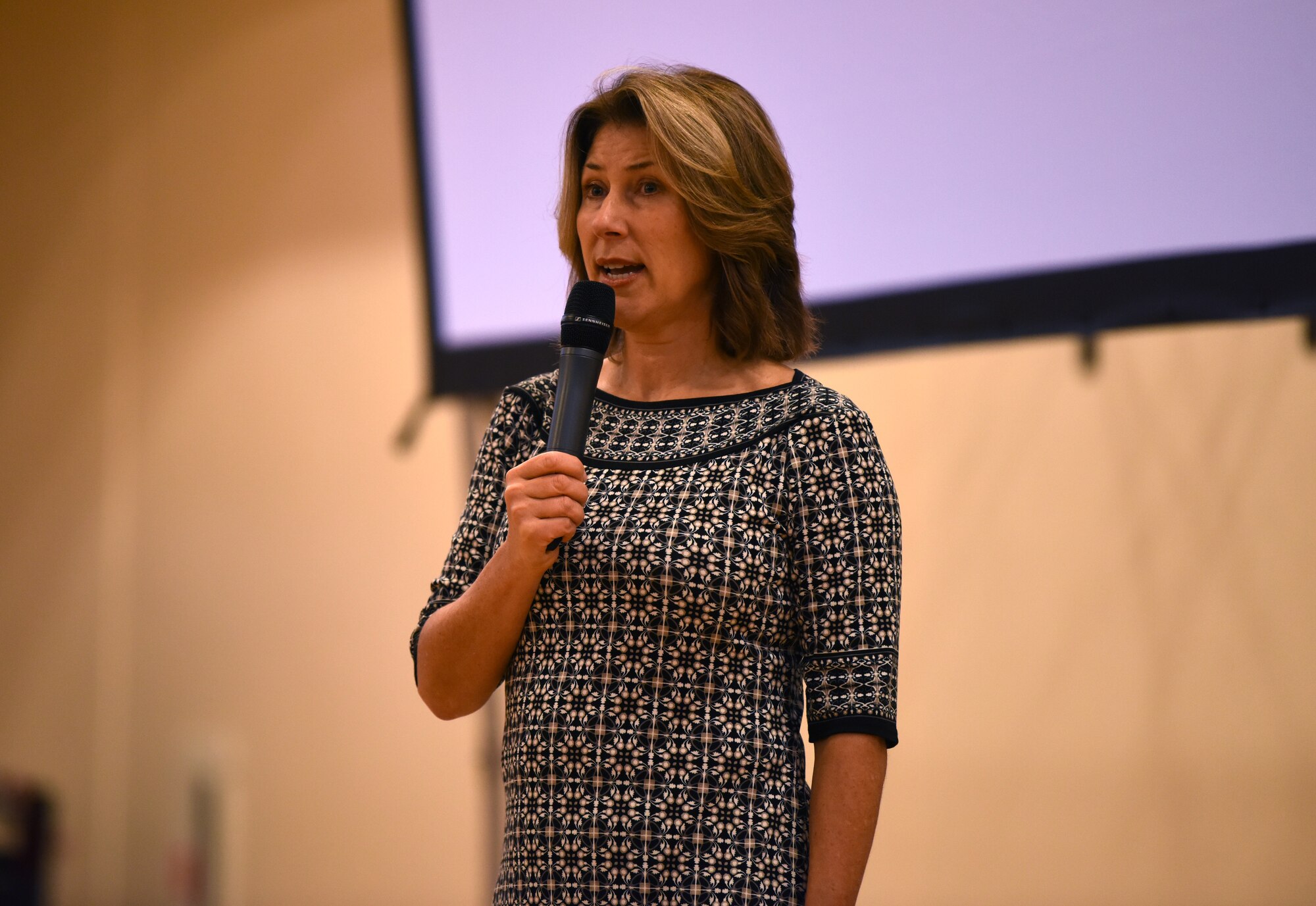 Gill Hayes, a mental health and suicide prevention speaker, presents her story during a Resilience Tactical Pause at RAF Mildenhall, England, Nov. 7, 2019. The 100th Air Refueling Wing hosted its second RTP Nov. 7 - 8 which included two guest speakers, an overview of base helping agencies and various small unit discussions. (U.S. Air Force photo by Senior Airman Brandon Esau)