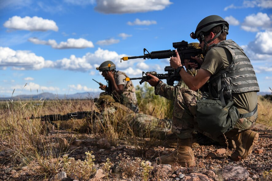 355th Wing Airmen respond to a simulated attack during Exercise Bushwhacker 19-08 at Libby Army Airfield, Arizona, Nov. 5, 2019. During this Dynamic Wing exercise, 355th WG Airmen responded to multiple scenarios involving simulated injured Airmen, emergency notification signals and more. (U.S. Air Force photo by Senior Airman Mya M. Crosby)