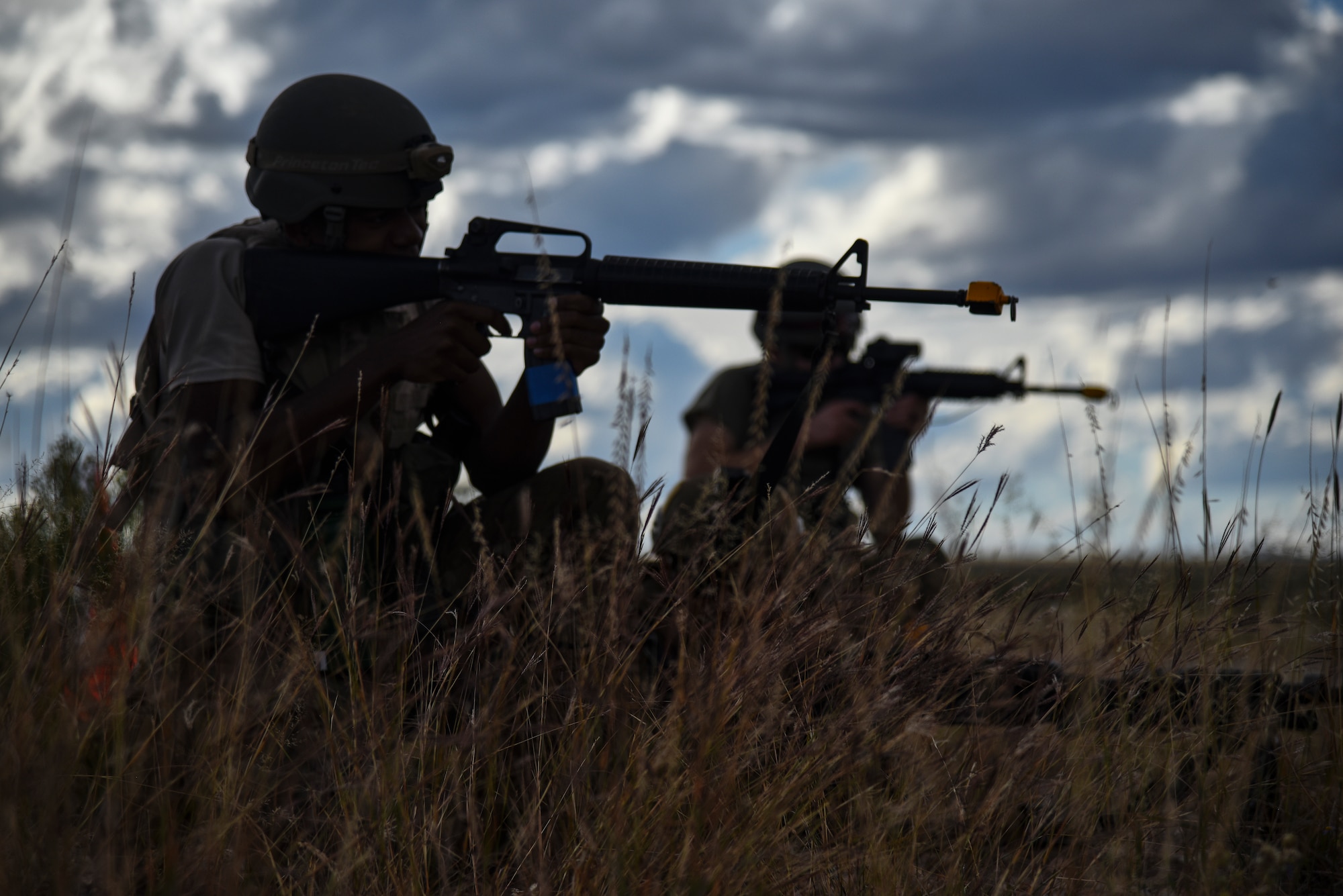 A photo of two airmen defending the base.