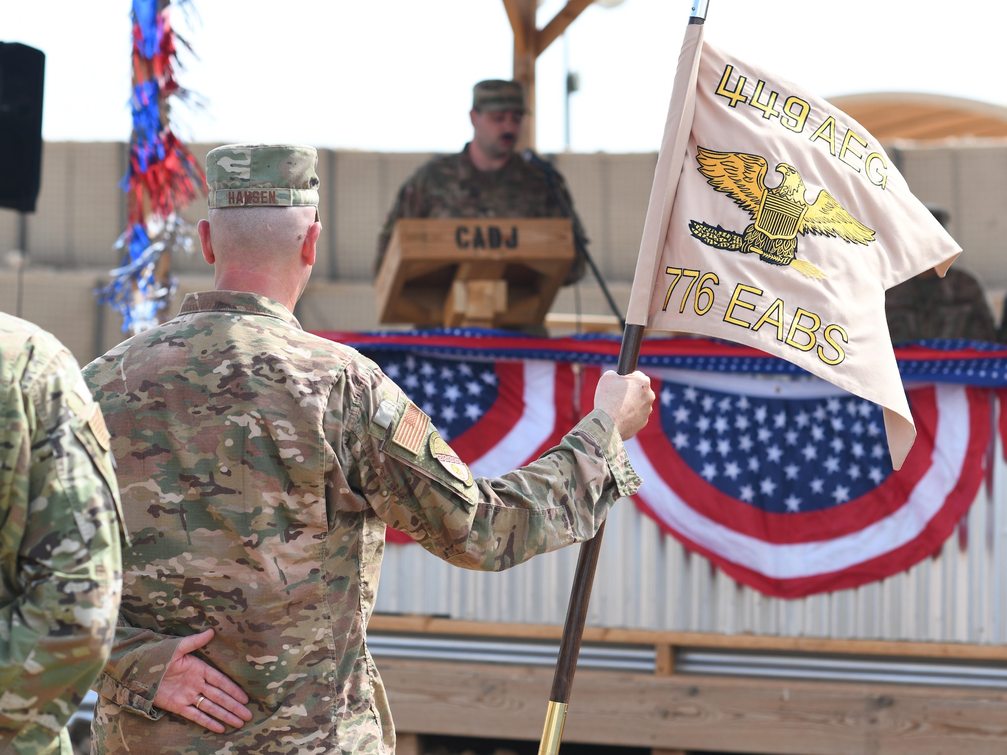 U.S. Air Force Senior Master Sgt. Matthew Hansen, 776th Expeditionary Air Base Squadron senior enlisted leader, bears the guidon during the first Veteran’s Day Ceremony held at Chabelley Airfield, Djibouti, Nov. 11, 2019. The 776th EABS Airmen held the inaugural ceremony to honor the service members that preceded them, especially the prior service contractors who work on the installation. (U.S. Air Force photo by Staff Sgt. Alex Fox Echols III)