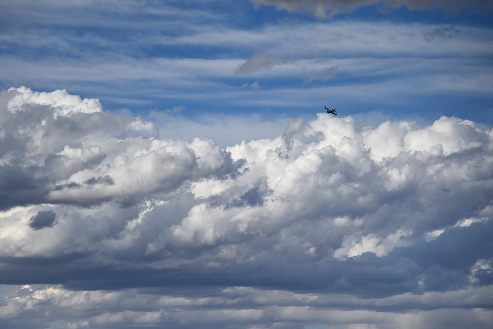 A photo of a KC-130J flying.