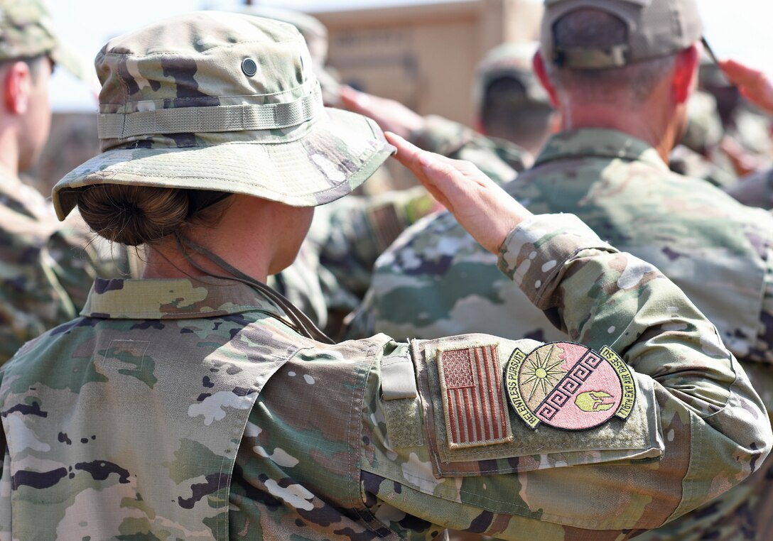U.S. Airmen deployed to the 776th Expeditionary Air Base Squadron salute during the first Veteran’s Day Ceremony held at Chabelley Airfield, Djibouti, Nov. 11, 2019. The 776th EABS Airmen held the inaugural ceremony to honor the service members that preceded them, especially the prior service contractors who work on the installation. (U.S. Air Force photo by Staff Sgt. Alex Fox Echols III)