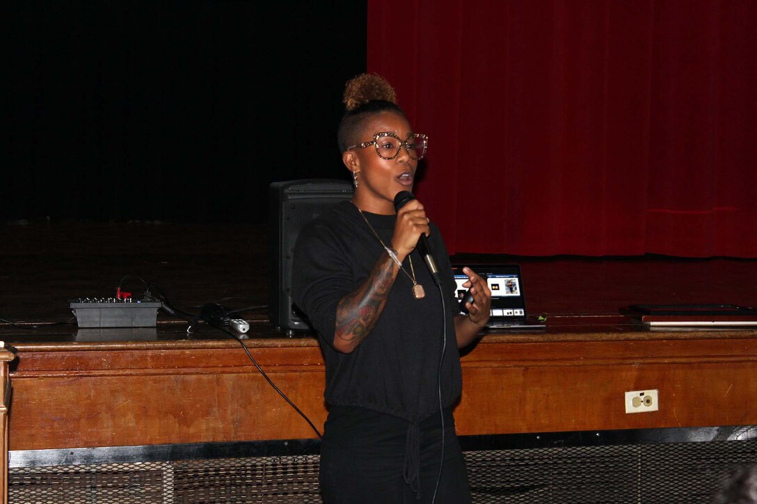 Kartinya Rodgers, a DLA Troop Support Construction and Equipment tailored vendor logistics specialist and Air Force veteran, gives a presentation during a Veterans Day event at the Gilbert Spruance Elementary School Nov. 7, 2019 in Philadelphia.