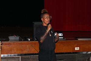 Kartinya Rodgers, a DLA Troop Support Construction and Equipment tailored vendor logistics specialist and Air Force veteran, gives a presentation during a Veterans Day event at the Gilbert Spruance Elementary School Nov. 7, 2019 in Philadelphia.