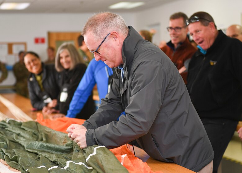 Peter Philips, a participant of the Joint Civilian Orientation Conference, attends a survival, evasion, resistance and escape (SERE) briefing at Joint Base Langley-Eustis, Virginia, Nov. 7, 2019.